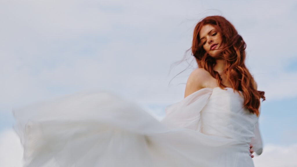 Image shows the natural and emotive quality when bride wears dress that moves freely.